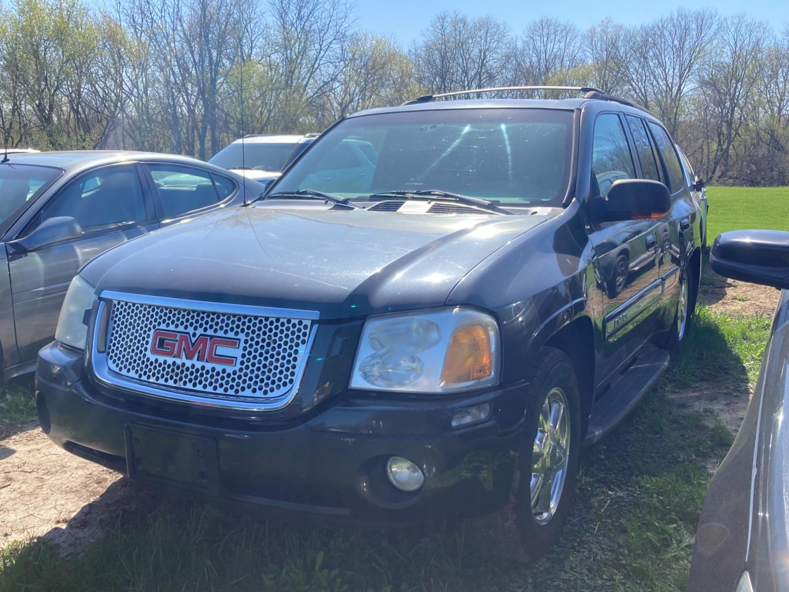2003 Charcoal GMC Envoy SLE 4WD (1GKDT13S332) with an 4.2L L6 DOHC 24V engine, 4-Speed Automatic Overdrive transmission, located at 1800 South Ihm Blvd, Freeport, IL, 61032, (815) 232-5543, 42.278645, -89.607994 - Photo #0